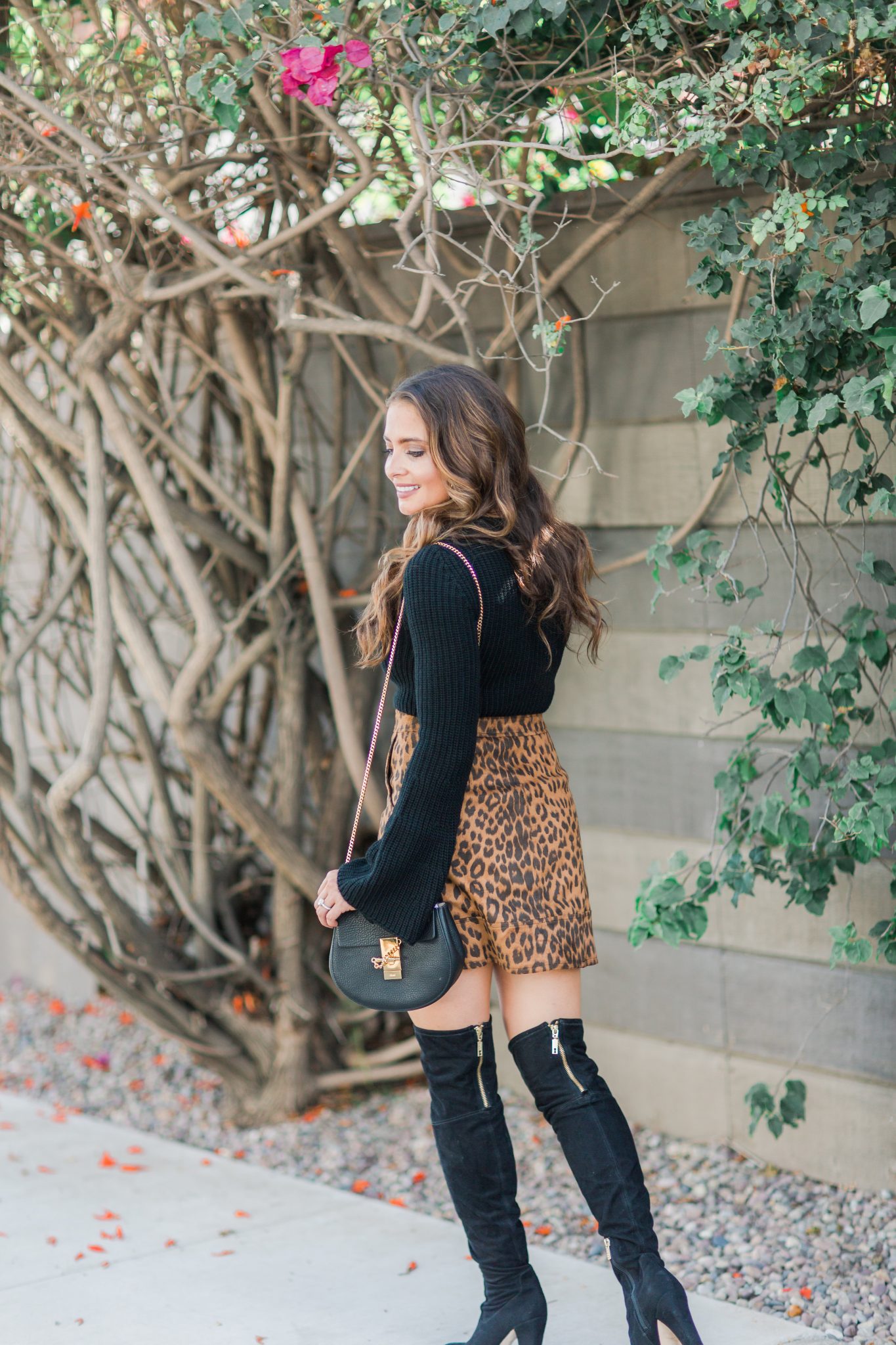 Maxie Elle | Leopard Skirt and OTK Boots - 27 Fun Facts About popular Orange County style blogger Maxie Elise