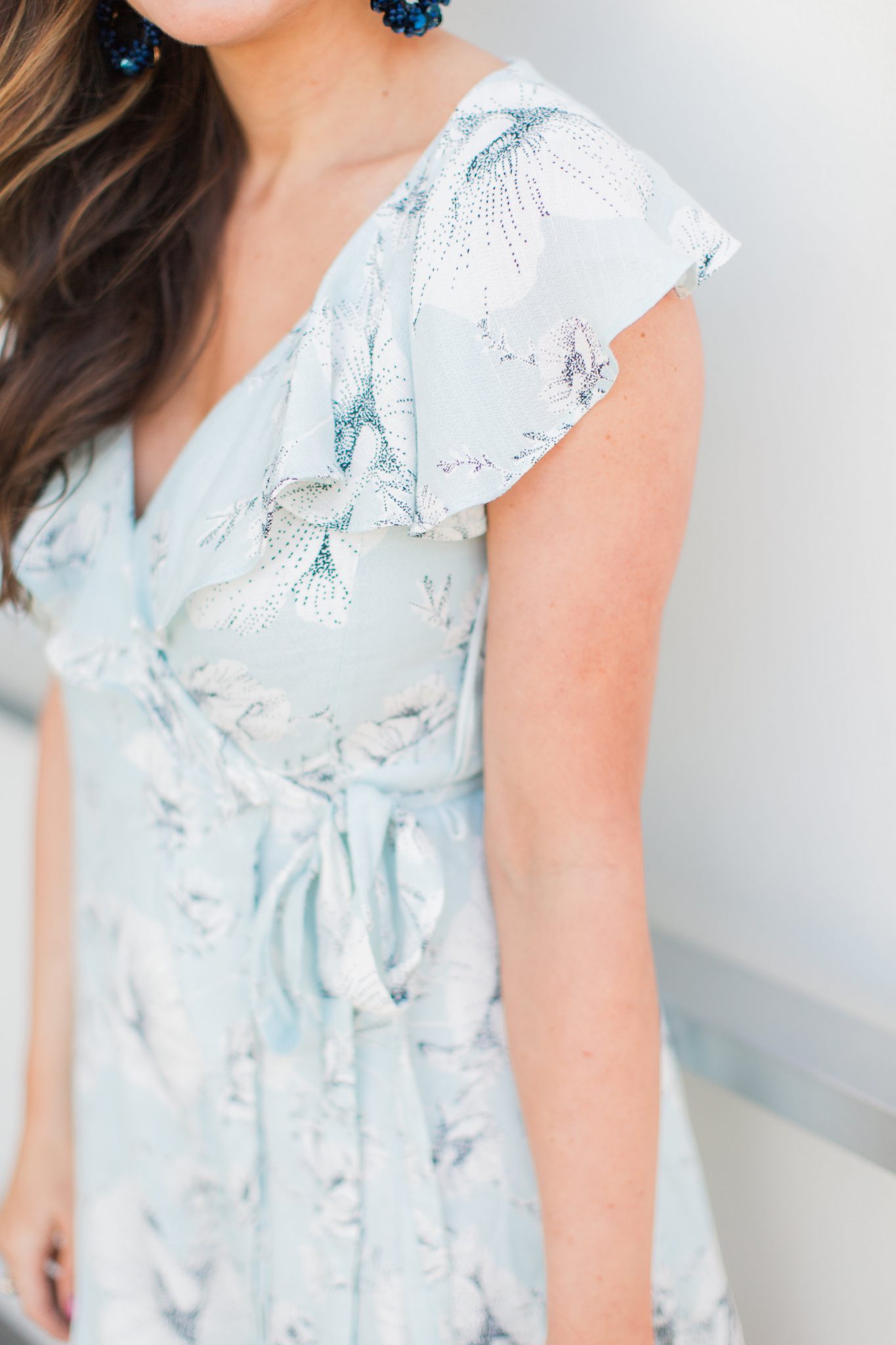 Floral wrap dress with flutter sleeve - My Favorite Cute Easter Dresses by popular Orange County fashion blogger Maxie Elise