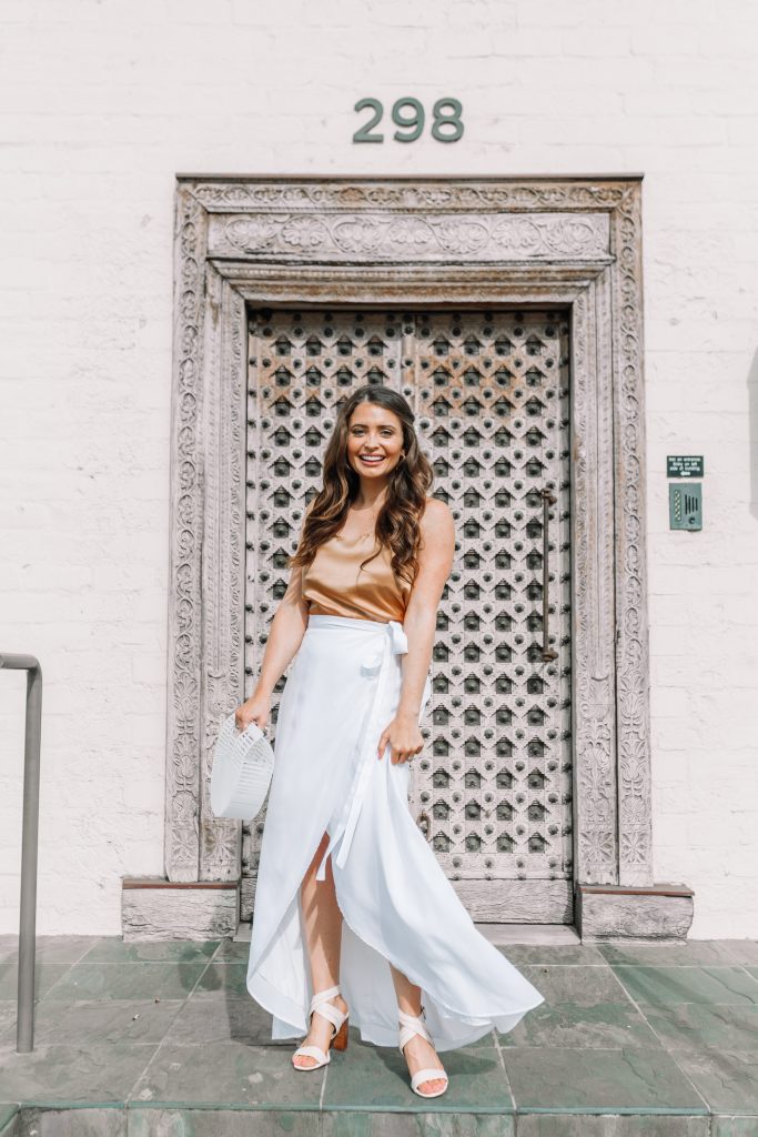 brunette girl in white maxi skirt