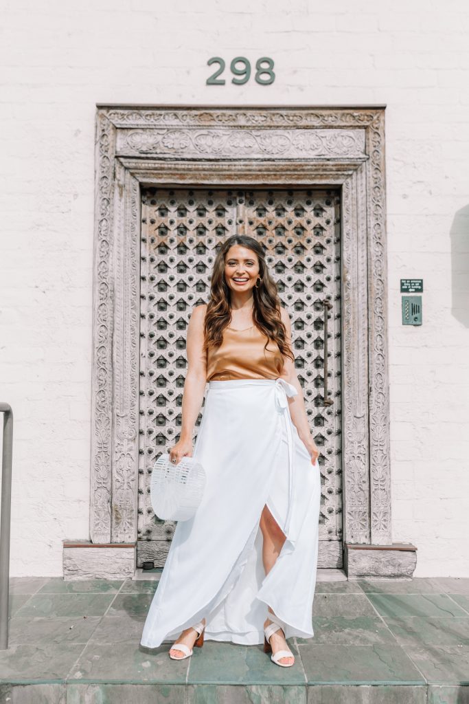 brunette girl in white maxi skirt