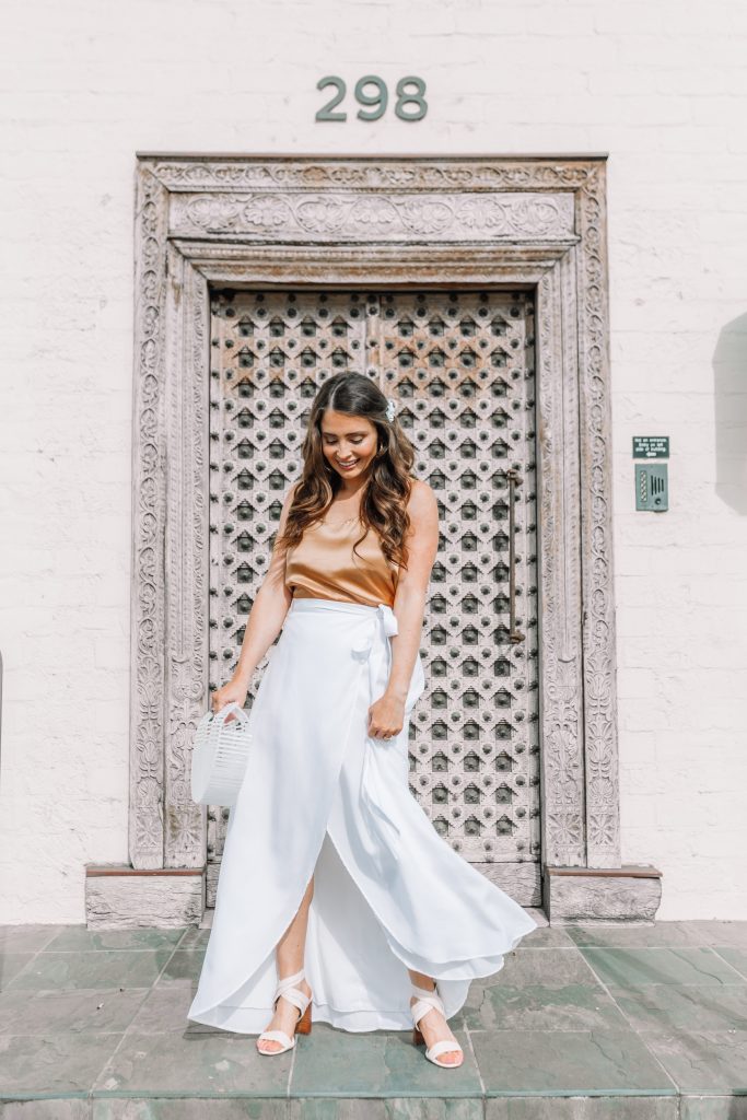 brunette girl in white maxi skirt