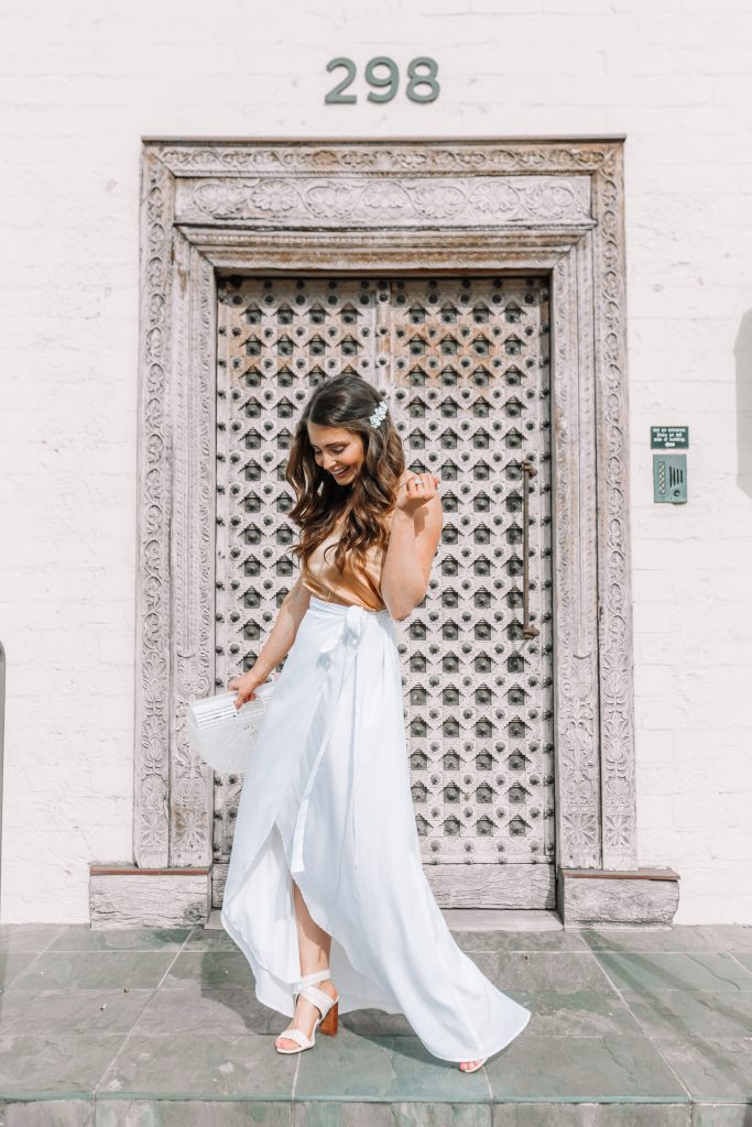 brunette girl in white maxi skirt